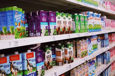 Colorful product packaging on supermarket shelves